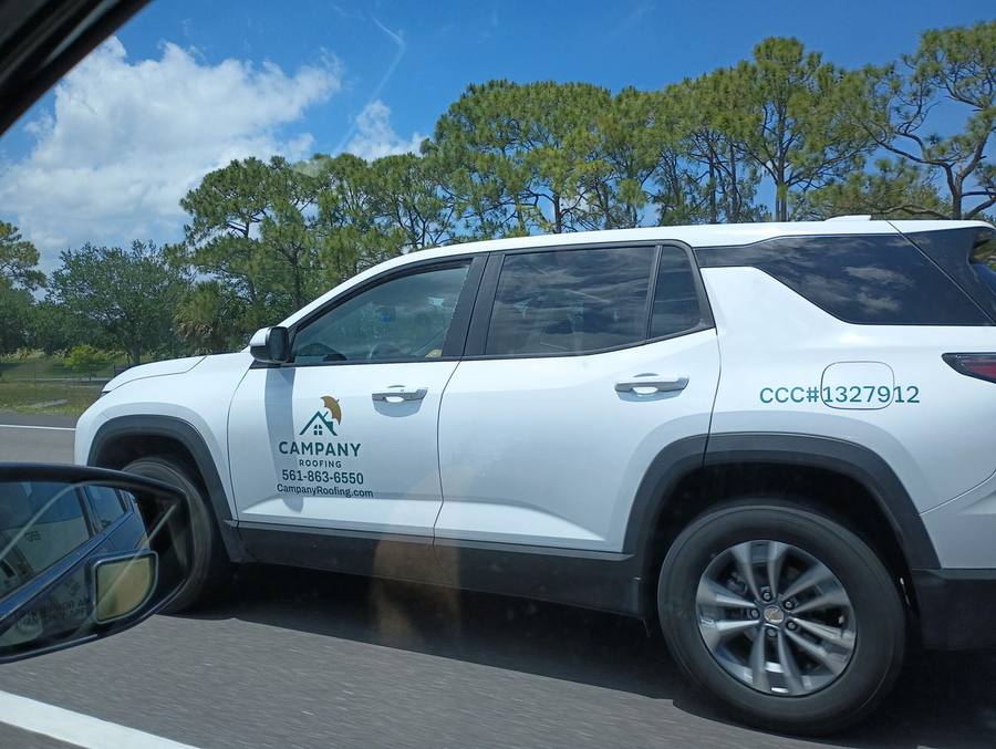 Campany Roofing lettered personal vehicle on I-95 northbound