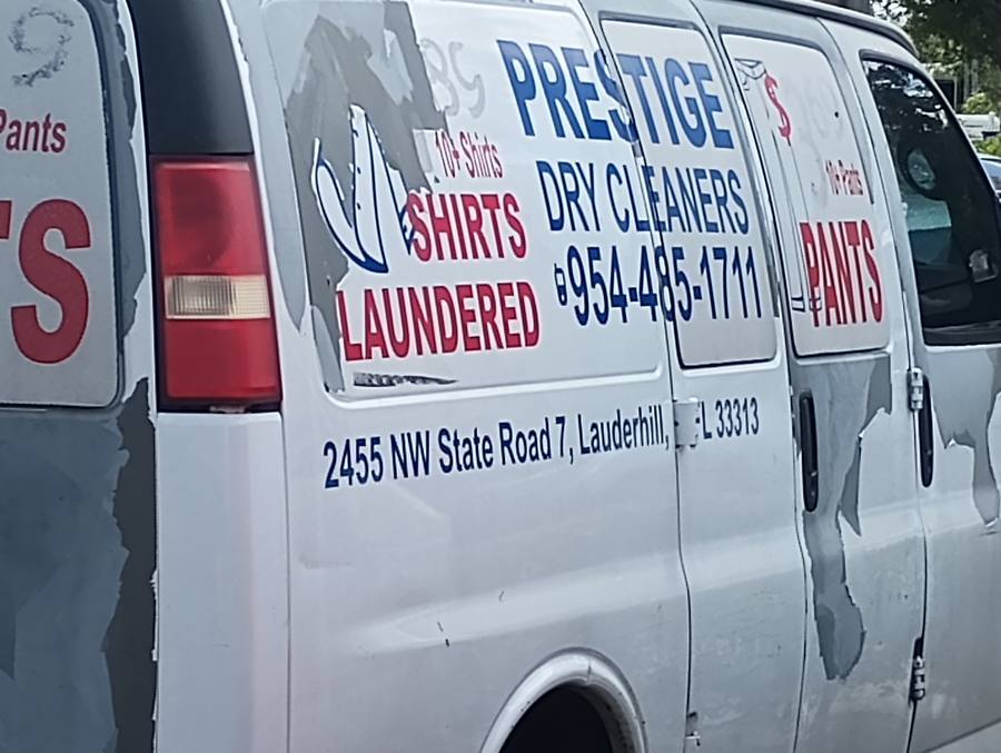 Prestige Dry Cleaners peeling van lettering on University Drive