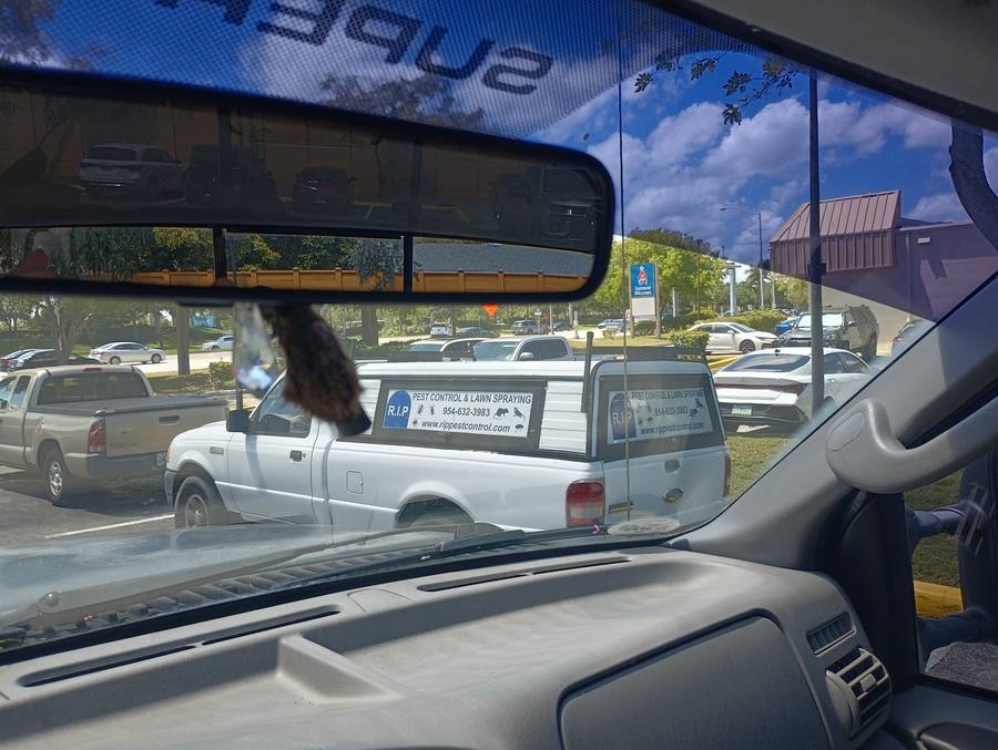RIP pest control truck in parking lot